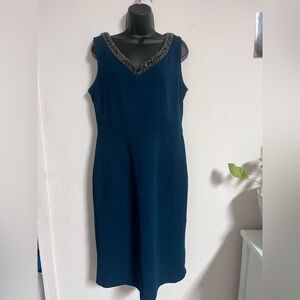 Elegant Blue Sleeveless Dress with Beaded Neckline